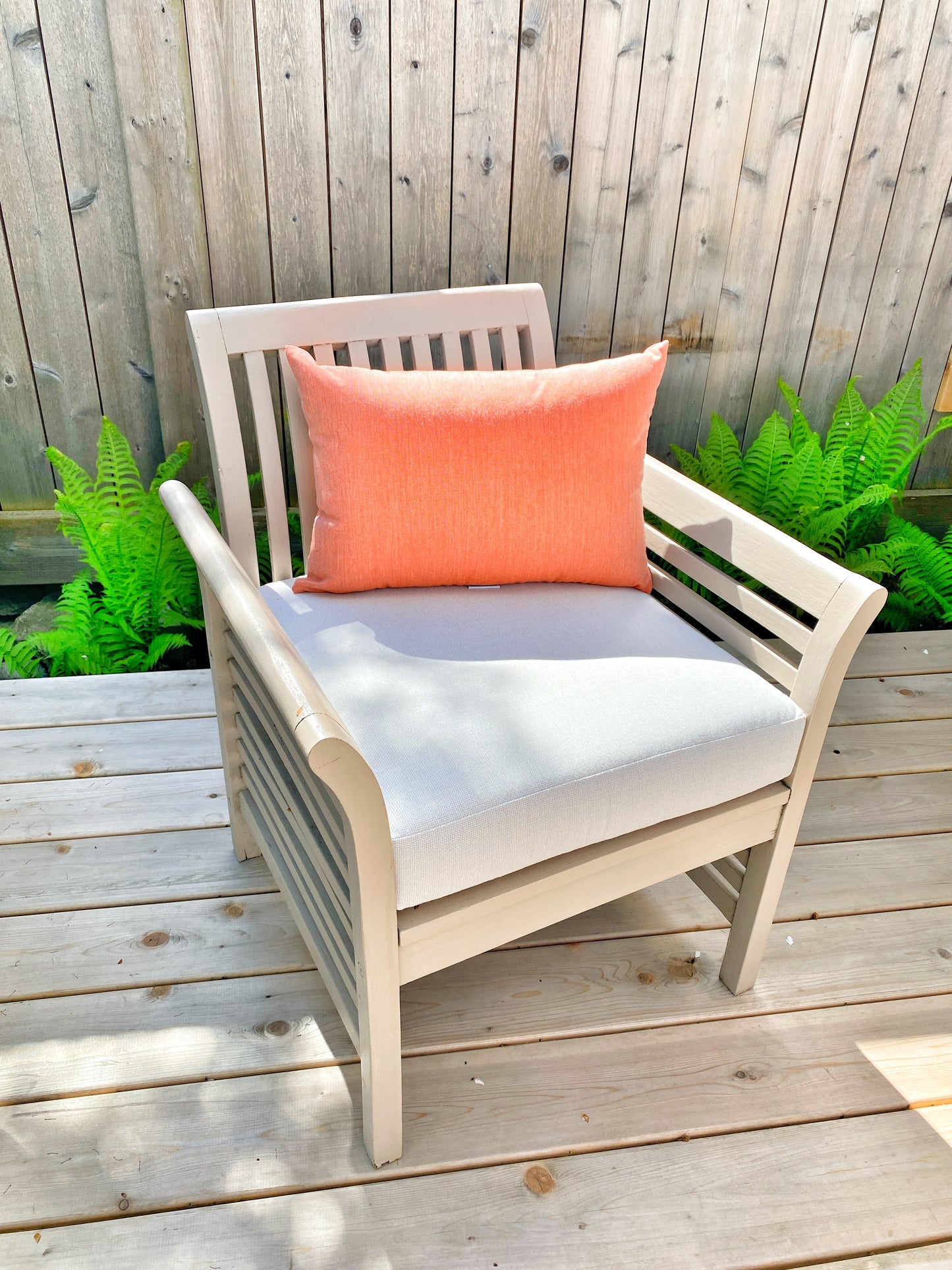 bright red orange outdoor pillow made with sunbrella fabric