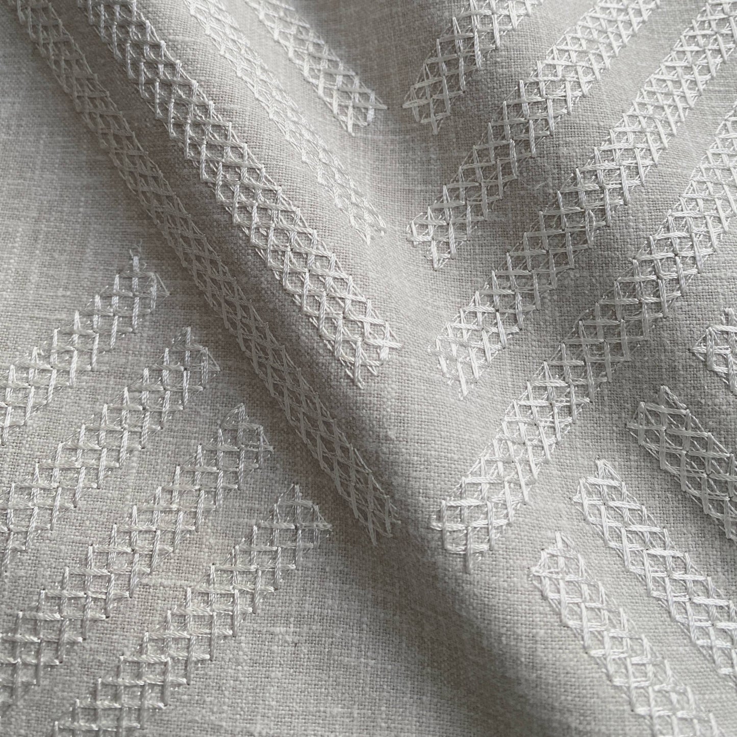 Grey chevron embroidered throw pillow