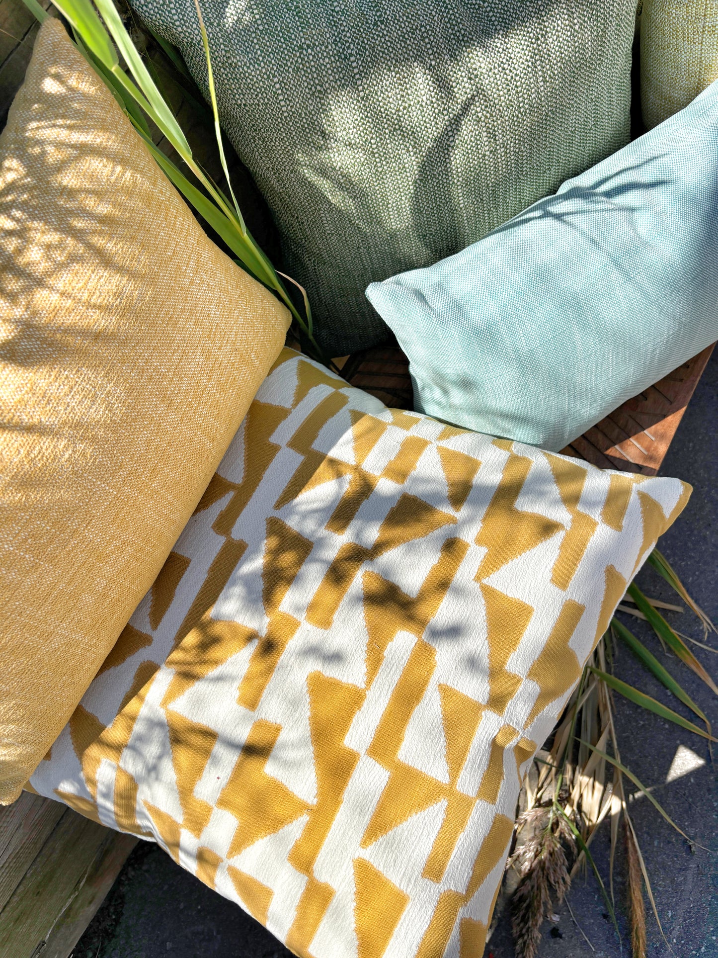 Indoor/ outdoor geometric pillow in gold. Weather resistant fabric for patio cushions, pillows and upholstery