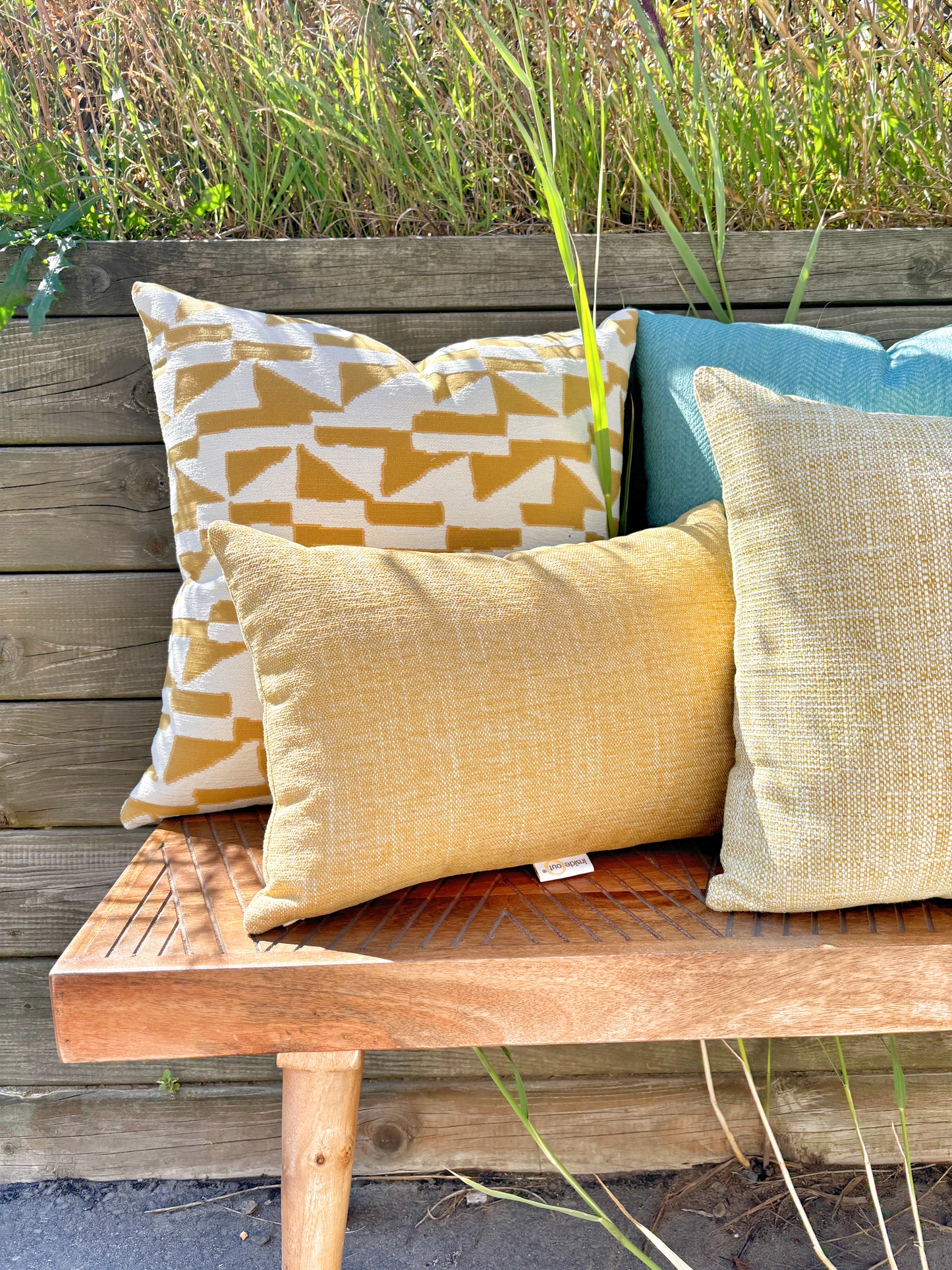 Indoor/ outdoor geometric pillow in gold. Weather resistant fabric for patio cushions, pillows and upholstery