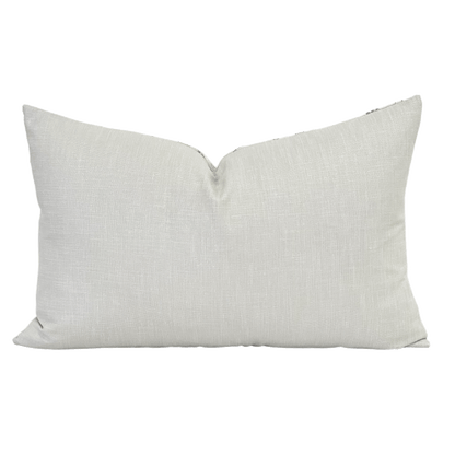 embroidered luxury fabric on a toss pillow in floral pattern