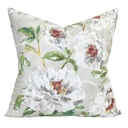 a dreamy floral printed pillow in an illustrated style. Green and pink hues