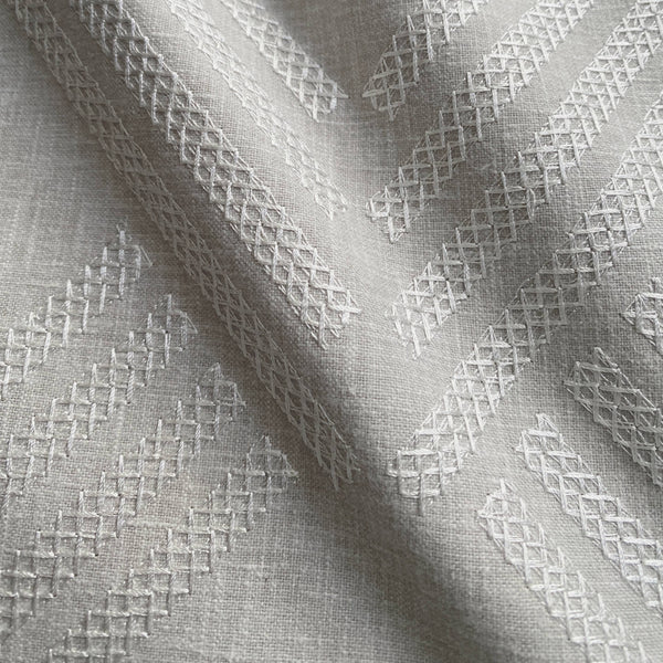Grey chevron embroidered throw pillow