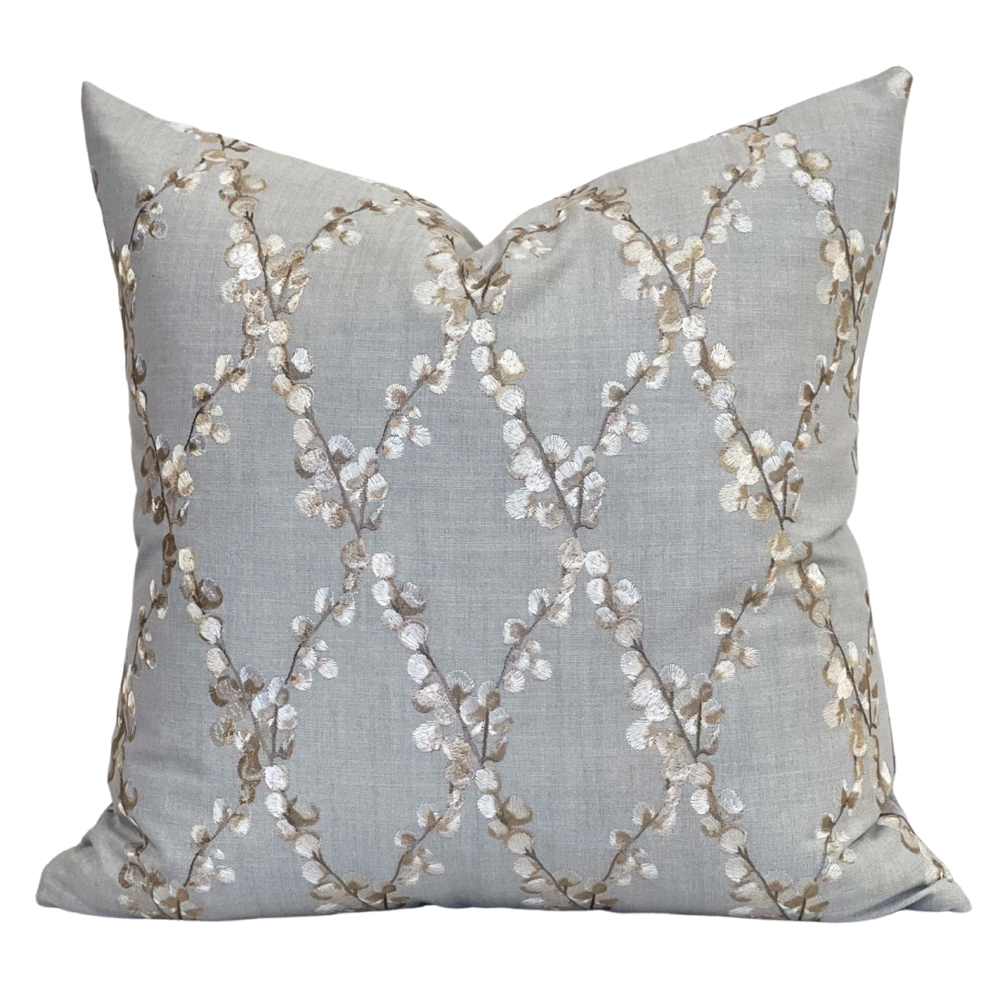 Embroidered floral blue pillow with linen fabric background