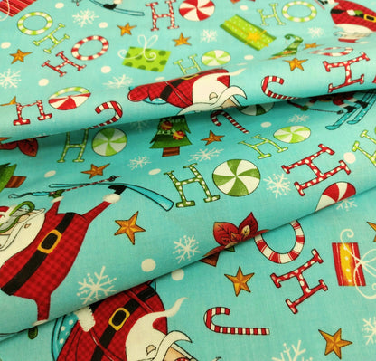 Extreme Santa - Multi Toss Turquoise by Northcott Fabrics 1/2yd Cuts 2 Coordinating Fabrics